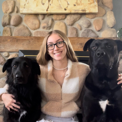 Rachel with her two two large dogs Ace and Harley